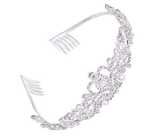 Detail of silver bridal crown showing intricate scrollwork and metal hair combs
