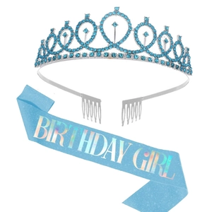 Detail of silver tiara with blue rhinestones and matching Birthday Girl glitter sash