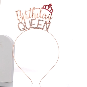 Detailed close-up of rose gold Birthday QUEEN headband with pink and white rhinestones