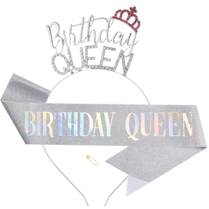 Detail of silver BIRTHDAY QUEEN tiara with pink crown and glitter sash with safety pin