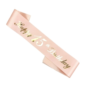 Pink satin birthday sash with gold Happy 15th Birthday cursive lettering for party events