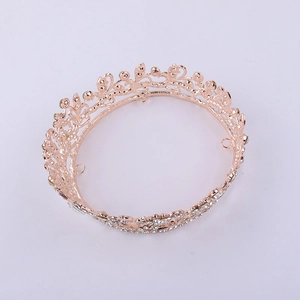 Elegant rose gold bridal crown with full circle of sparkling rhinestones for parties