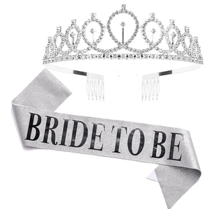 Close-up of sparkling silver rhinestone tiara and glittery Bride To Be sash set