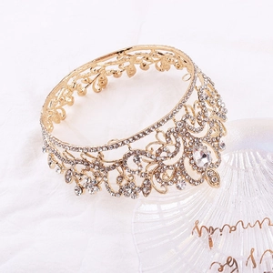Luxurious gold round bridal crown with full crystal rhinestones and flower details