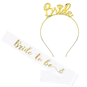 Detail of rose gold Bride headband and white satin Bride to be sash set for party