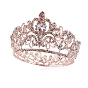 Elegant rose gold bridal tiara with full rhinestones and a central teardrop crystal
