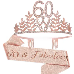 Close-up of rose gold 60th birthday tiara with rhinestones and pink glitter sash