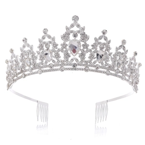 Detail of silver Baroque bridal crown featuring sparkling rhinestones and side hair combs
