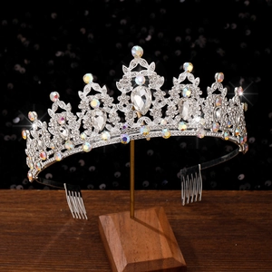 Detail of silver baroque bridal tiara with water drop crystals and side hair combs