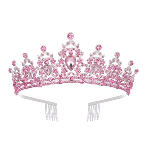 Detail of pink rhinestone bridal crown with silver base and pear-shaped gems