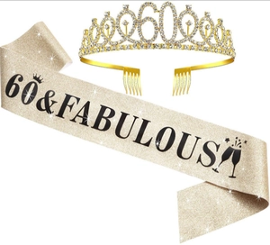 Detailed set of a gold rhinestone 60th birthday crown and champagne glitter sash decor