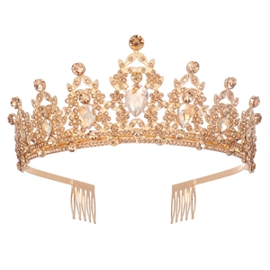 Detailed view of champagne crystal bridal crown with golden alloy hair comb for weddings