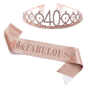 Detail of rose gold 40th birthday rhinestone crown and 40 & Fabulous glitter sash set