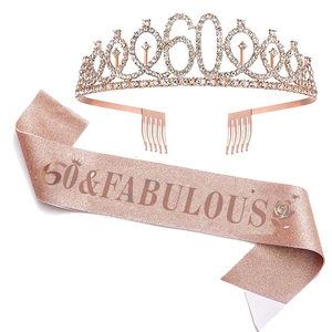 Detail of rose gold 60th birthday tiara and 60 & Fabulous glitter sash set for party