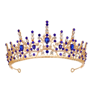 Luxury gold bridal crown with deep blue crystals and rhinestones for wedding parties