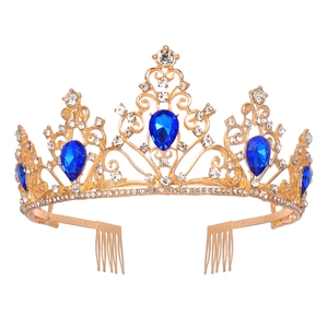 Luxurious gold baroque bridal crown with blue teardrop gemstones and white crystals