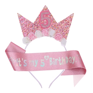 Close-up of pink glitter crown headband and 5th birthday sash set for little girls