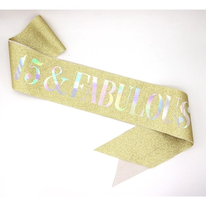 Glittery gold birthday sash with 15 & FABULOUS holographic text for party celebration