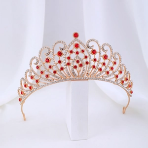Elegant gold tiara with red gemstones and crystals for bridal wedding hairstyles
