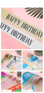 Detail of glitter Happy Birthday party sashes in multiple vibrant metallic colors