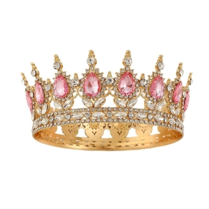 Luxurious gold crown with pink teardrop rhinestones for bridal hairstyle or cake topper