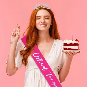 Fuchsia birthday sash with 13th tiara set on smiling model for teen party