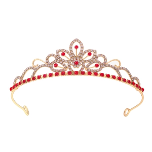 Golden bridal tiara with sparkling red heart crystals and white rhinestones on white base