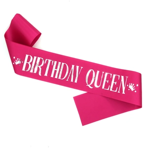 Magenta satin Birthday Queen sash with silver lettering and crown for party celebrations