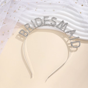 Detail of silver bridesmaid headband with sparkling rhinestone letters and metal finish
