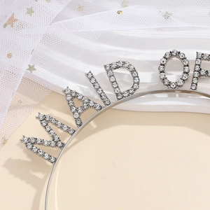Detailed close-up of silver rhinestone Maid Of Honor headband with sparkling crystals