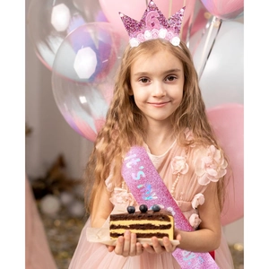Pink birthday crown and sash set for 6 year old girl with glittery sequins and white flowers