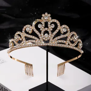 Macro detail of a gold bridal crown with sparkling rhinestones and heart filigree patterns