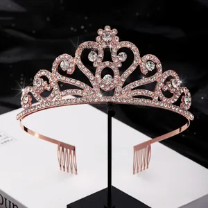 Detailed view of rose gold bridal tiara with sparkling heart rhinestones and hair combs