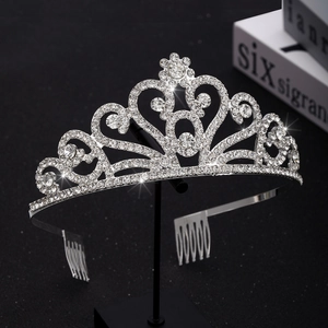 Sparkling silver crown tiara with heart crystal design and integrated hair combs
