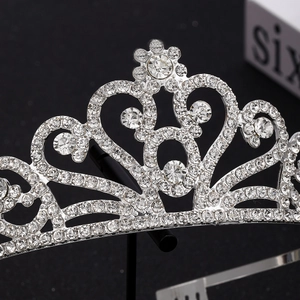 Sparkling silver alloy bridal tiara crown with intricate rhinestones and heart floral pattern