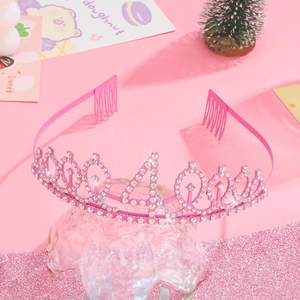 Detail of pink birthday crown headband with sparkling rhinestones and number 4 for girls