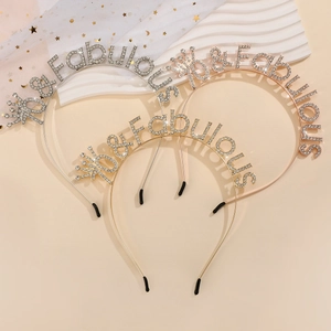 Detailed view of rhinestone headbands in gold and silver with 70 80 90 Fabulous text
