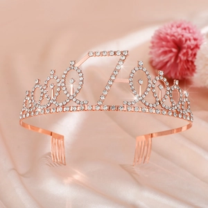 Detail of rose gold number 7 tiara for girls birthday with rhinestones on pink silk