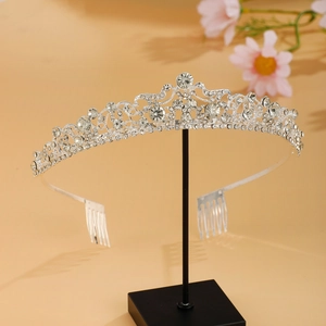 Detailed close-up of luxury bridal tiara with sparkling pear-cut rhinestones and side combs