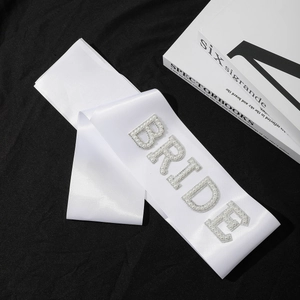 White satin bride sash with pearl and rhinestone lettering for bridal shower party