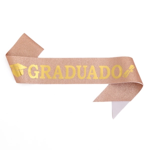 Detail of rose gold glitter GRADUADO sash with gold foil graduation icons and lettering