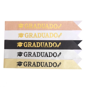 Close-up of glitter GRADUADO sashes in various colors with gold and black lettering