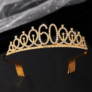 Close-up of gold 60th birthday tiara with sparkling rhinestones and securing combs