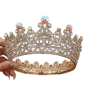 Luxurious vintage gold bridal tiara with intricate镂空 patterns and AB crystal rhinestones