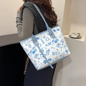 Chic large-capacity white tote bag with blue graffiti prints and light blue straps