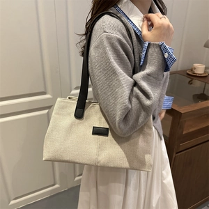 Linen canvas shoulder tote bag with black leather straps and contrast patch for women