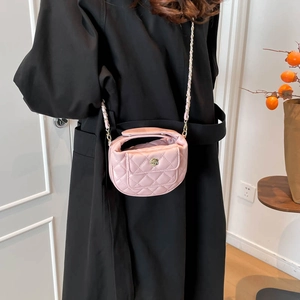 Pink quilted crossbody bag for girls with golden camellia flower buckle and chain strap