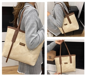 Detailed views of a beige denim tote bag with brown leather trim and handle