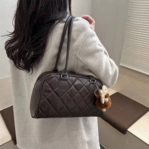 Deep brown quilted shoulder bag with classic diamond stitching and cute teddy bear charm