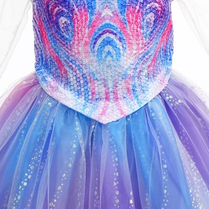 Close-up of sparkling blue and purple mesh skirt with sequins and glitter details